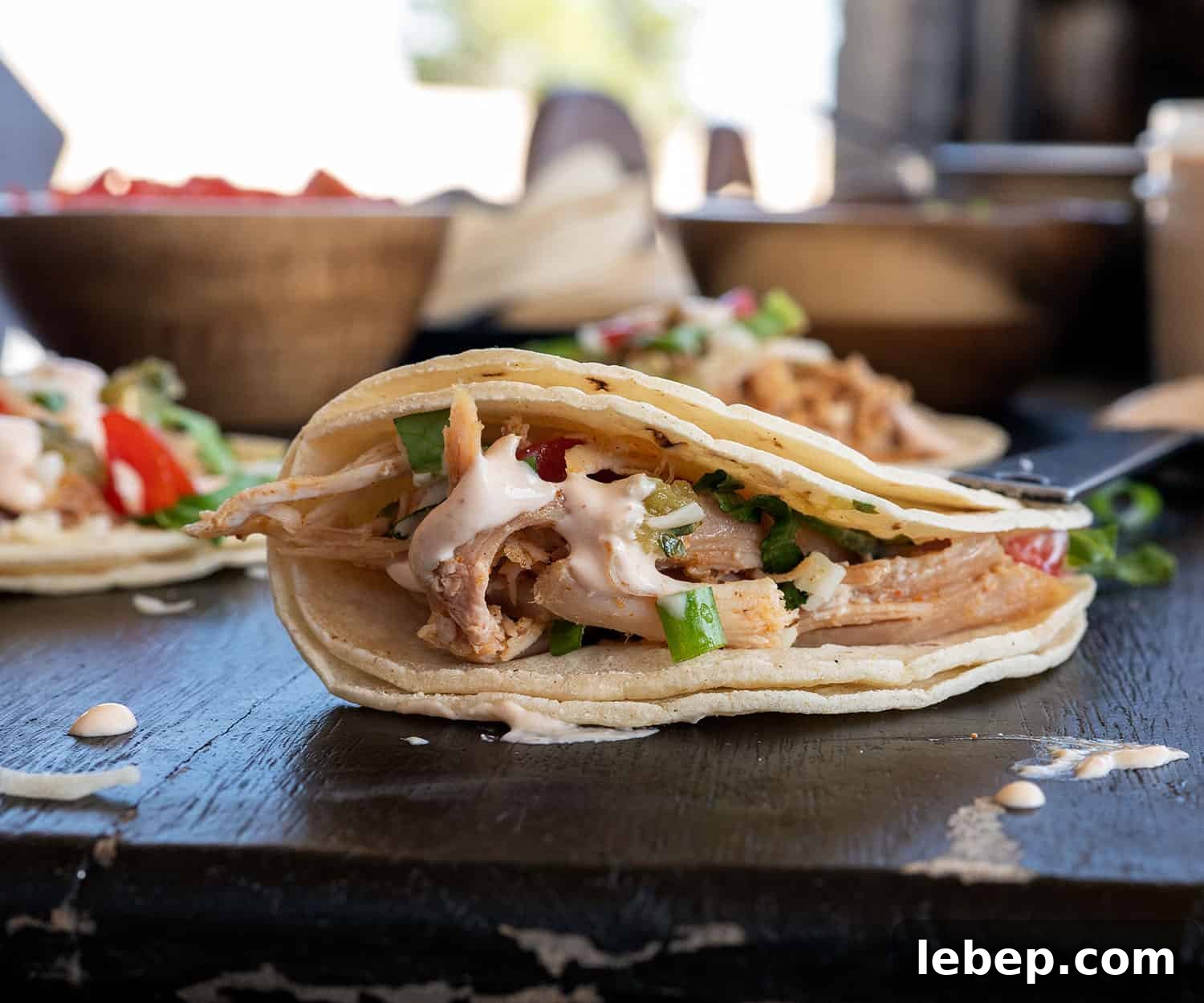close up of folded pulled turkey taco