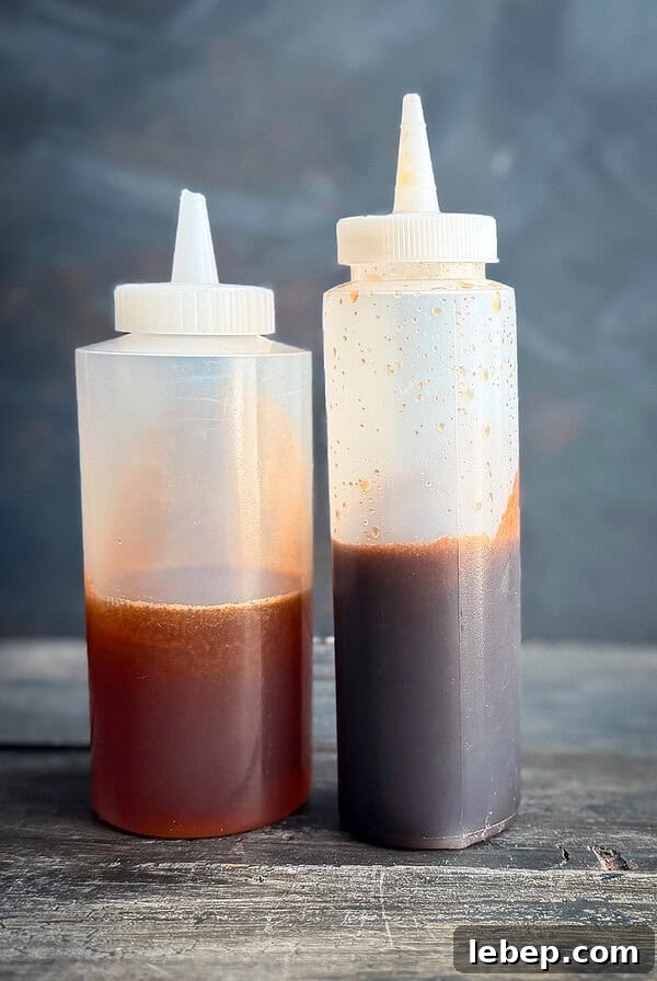 two squeeze bottles with hot honey.