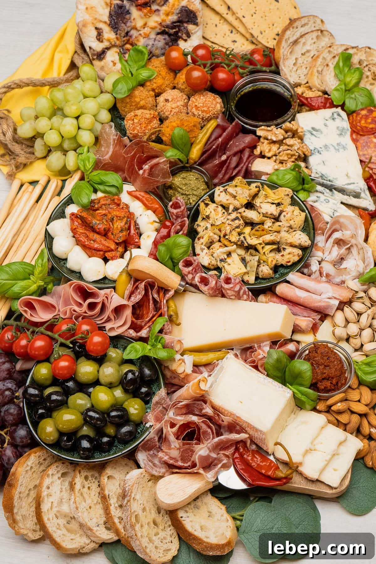 Ultimate Italian Antipasto Meat & Cheese Platter Guide 2 Italian Charcuterie Board with cured meats, cheeses, olives, tomatoes, nuts and breads