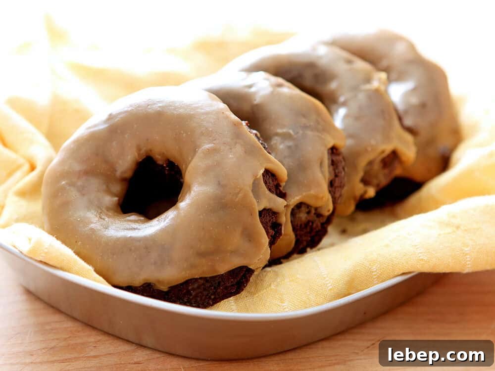 Freshly glazed Baileys Salted Caramel Espresso Doughnuts