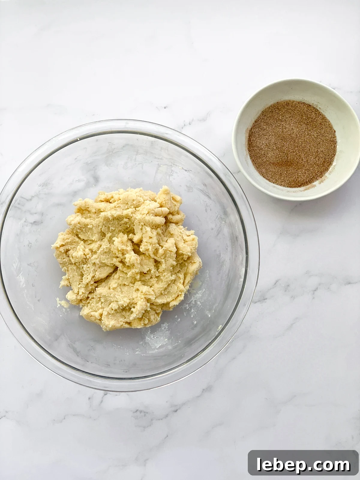 Snickerdoodle Cookies Without Cream of Tartar — Soft, Cinnamon-Sugar Recipe 8 dough done and cinnamon sugar next to it