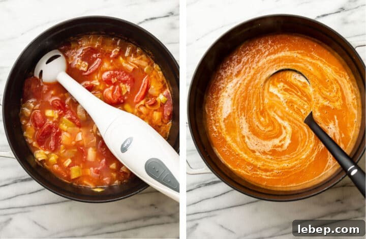 Creamy Potato, Leek & Tomato Soup Recipe for Cozy Meals 5 pureeing potato leek tomato soup with an immersion blender and adding in cream