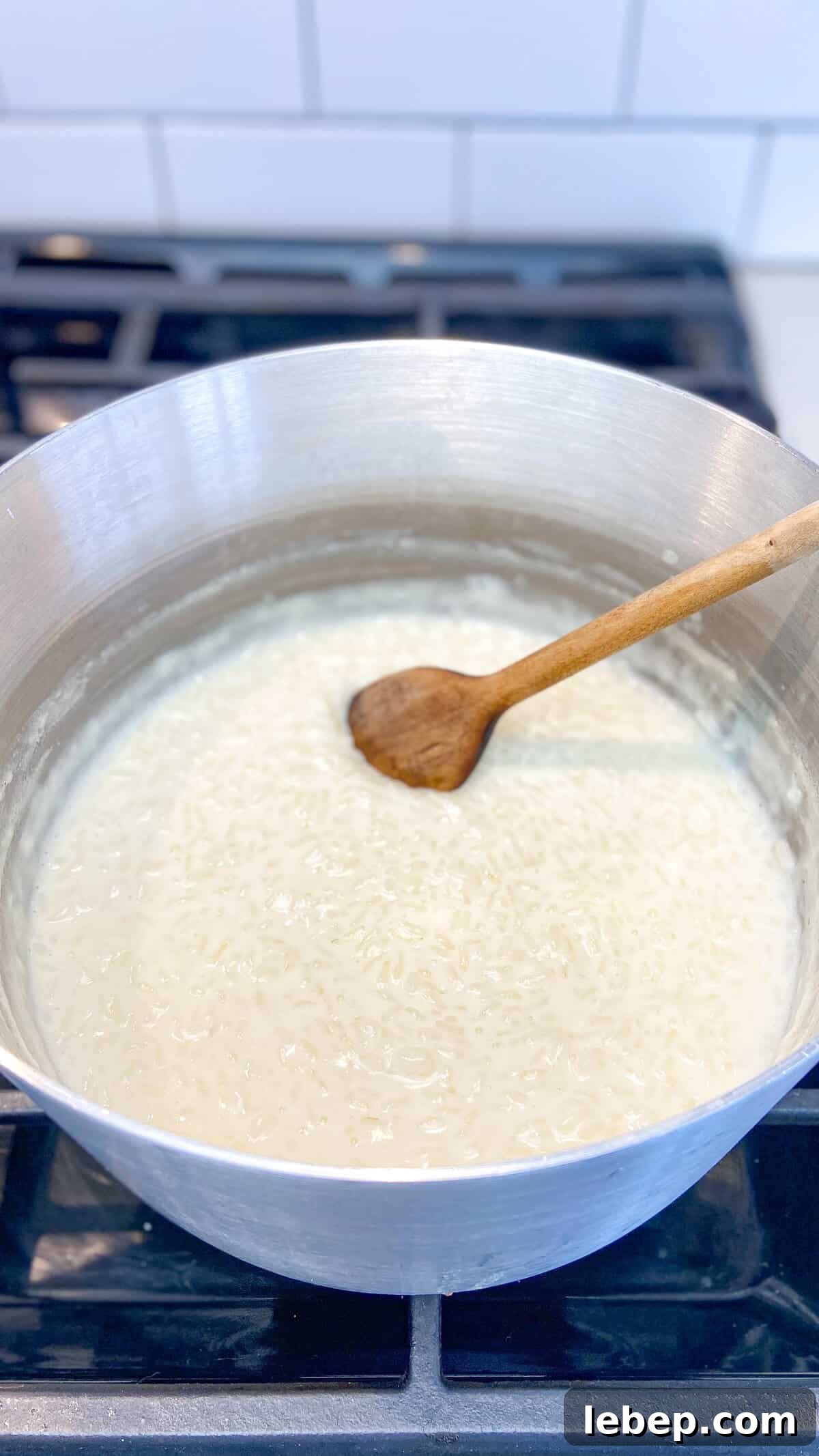Creamy Homemade Rice Pudding Recipe with Vanilla and Cinnamon 7 Finishing in a pot.