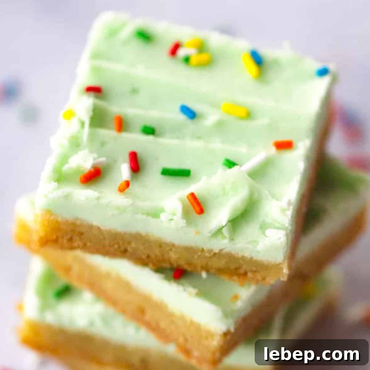 cookie bars with lime coconut buttercream frosting