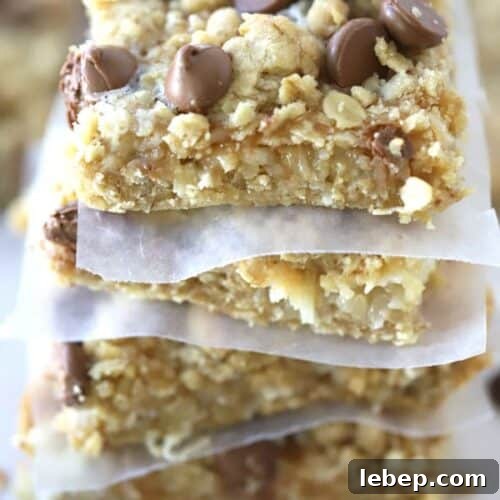 Coconut Caramel Magic Bars stacked on top of each other