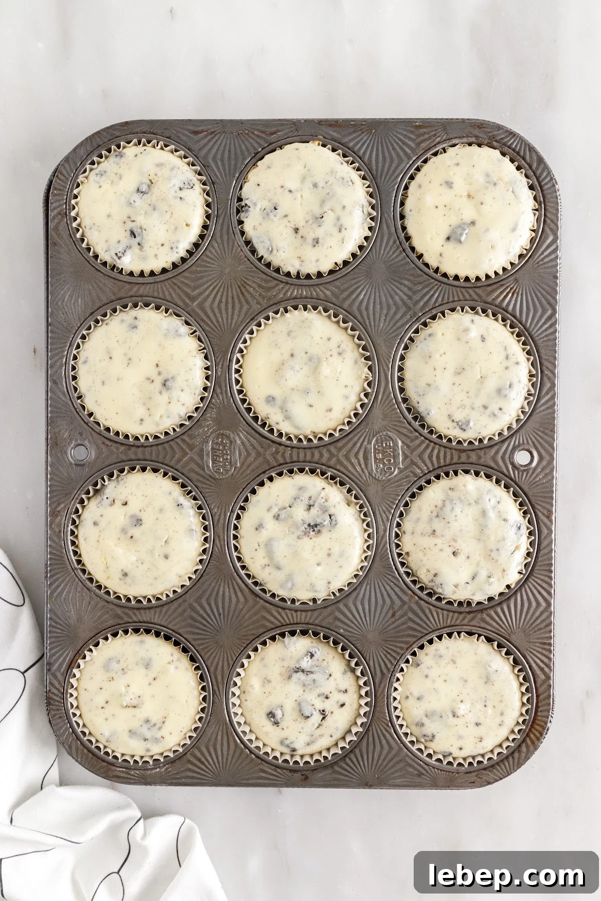 Fully baked mini cheesecakes.
