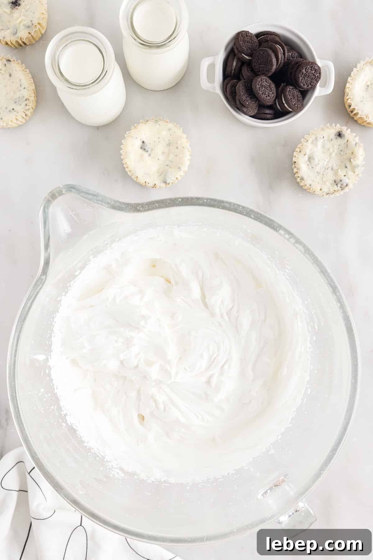 Whipped cream topping ingredients in a large bowl.