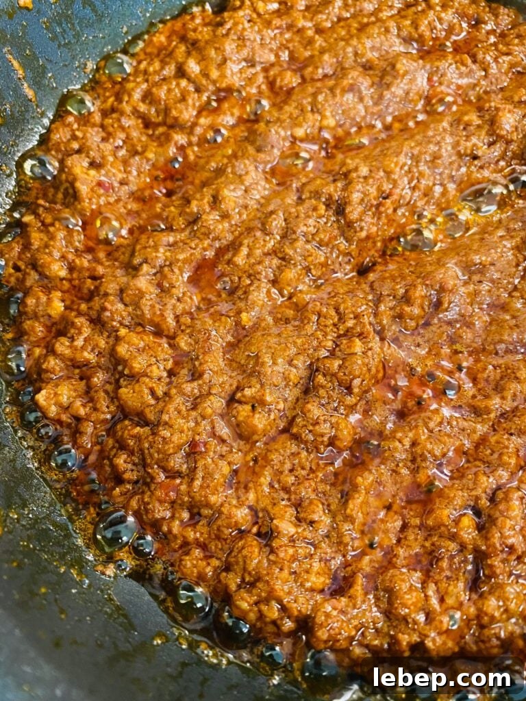chorizo cooking in a skillet