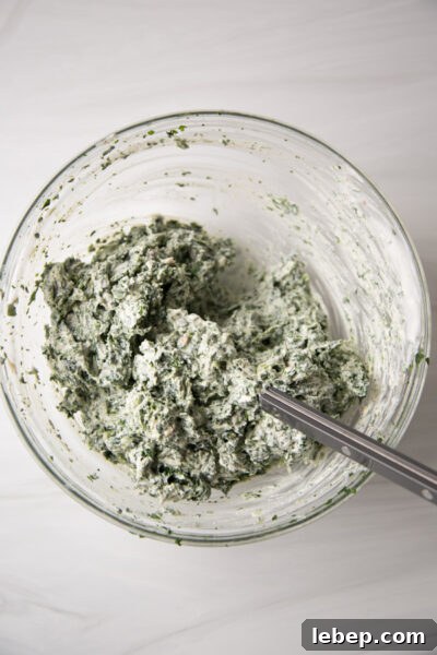 Creamy Warm Spinach Dip — Dairy- and Gluten-Free Recipe 8 bowl of spinach dip mixed together