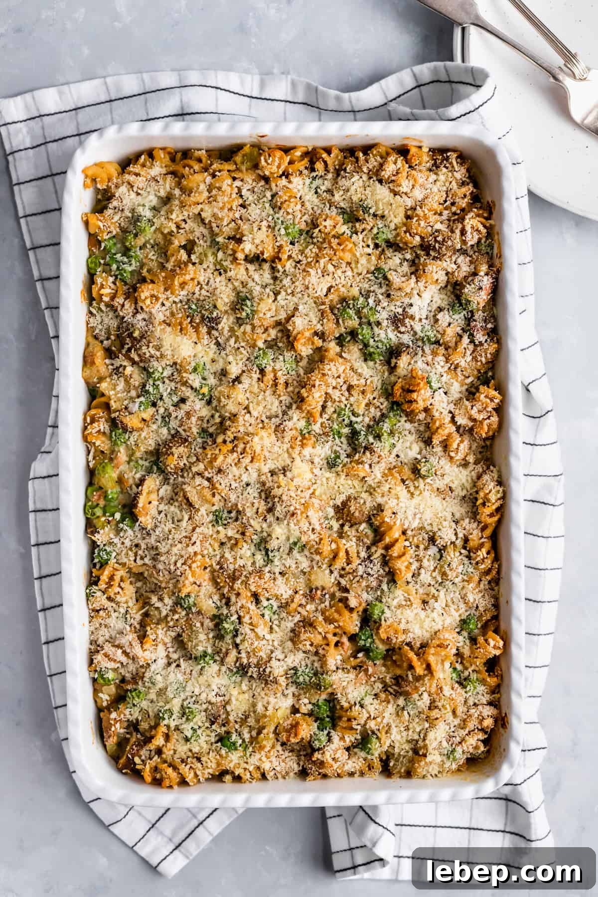 baking dish with casserole and dish towel