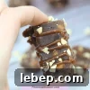 No-bake homemade snickers bar with caramel and peanuts.