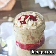Mason jar with peanut butter and jelly overnight oats.
