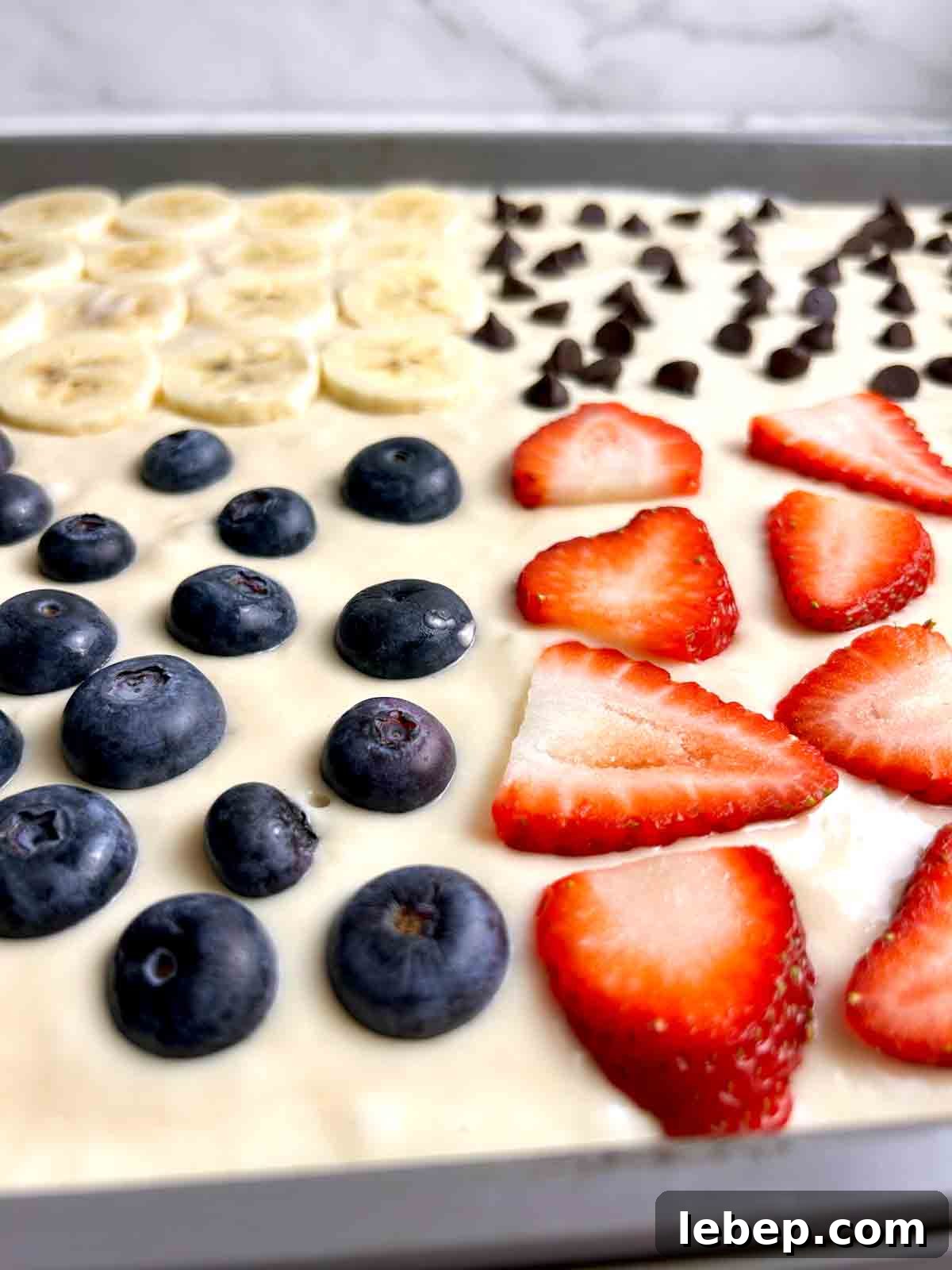 close up of batter with toppings.