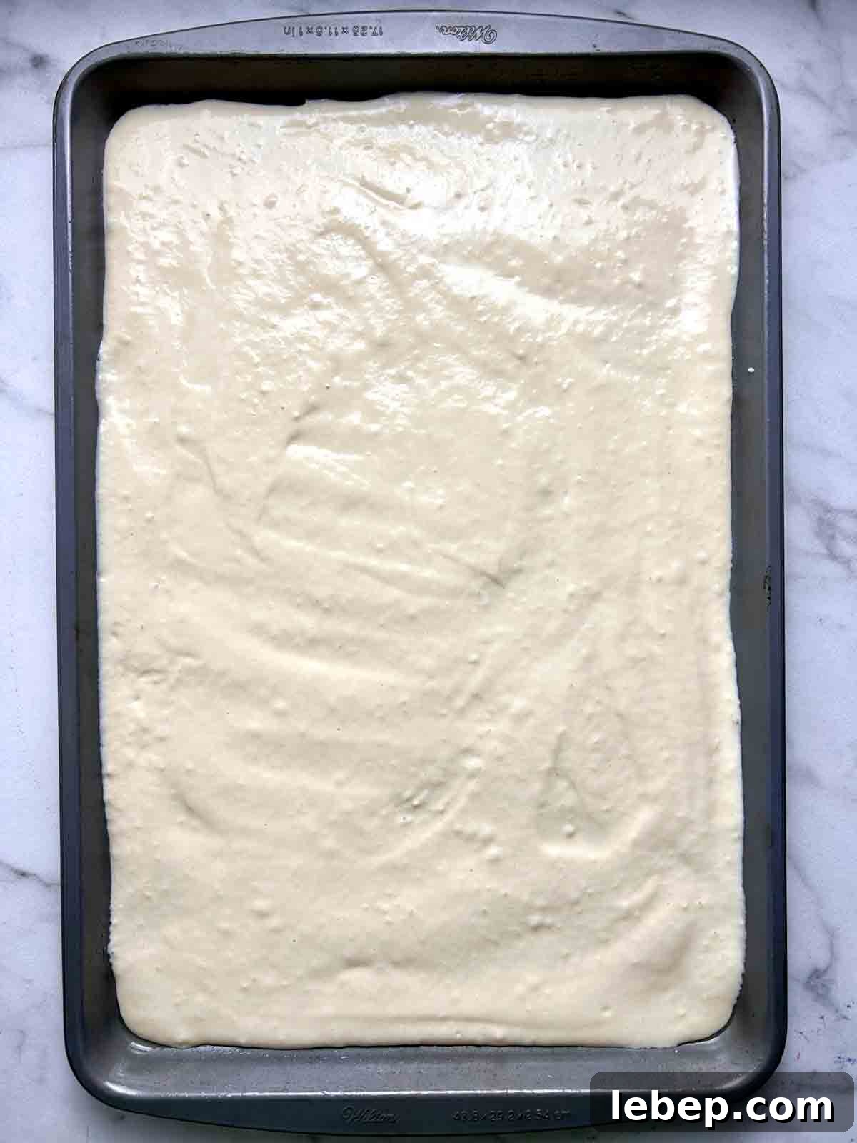 batter spread onto sheet pan.