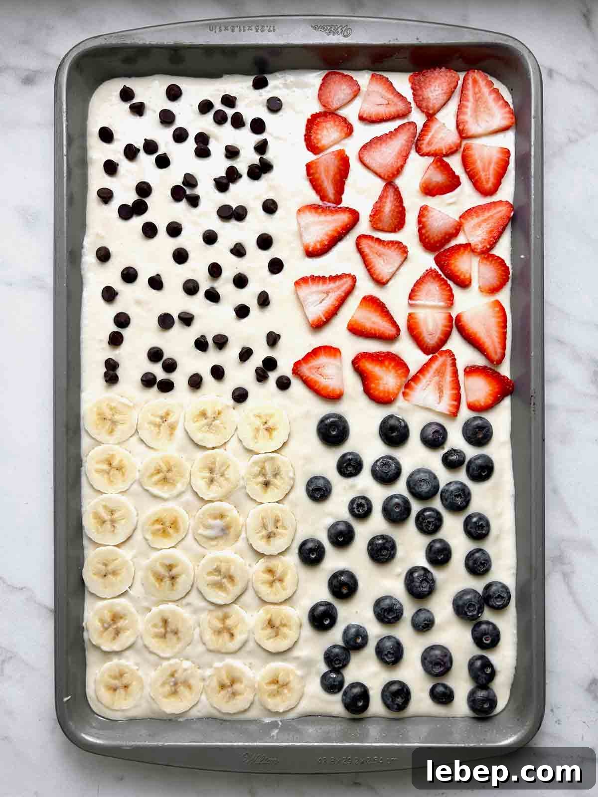 toppings added to 4 quadrants of batter.