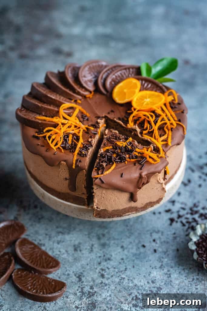 Chocolate orange cheesecake with one slice cut