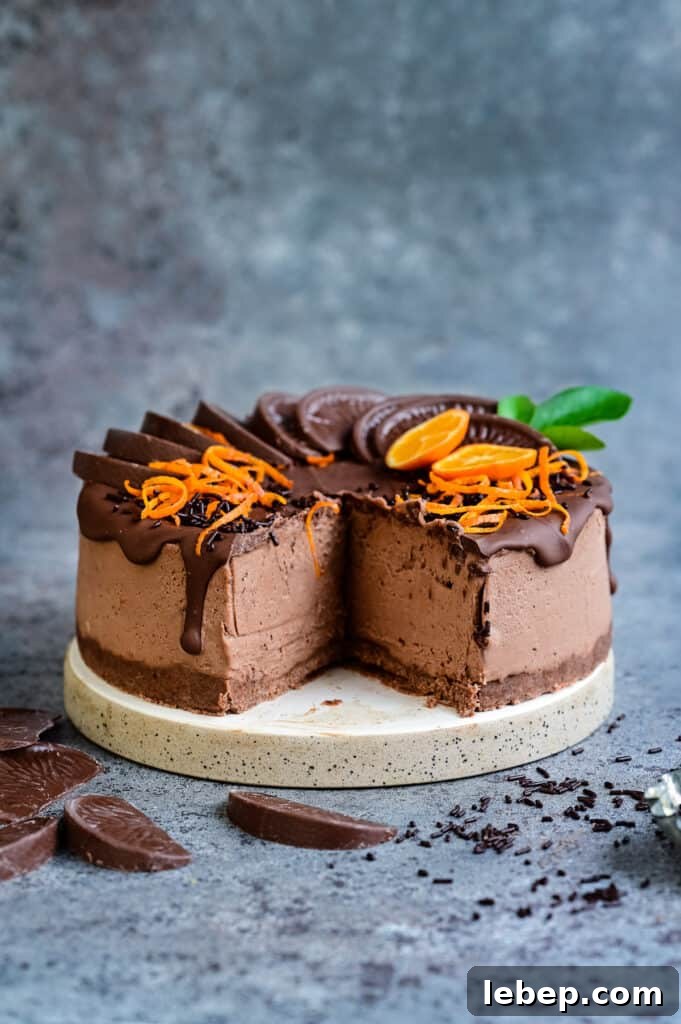 Terry's Chocolate Orange cheesecake on a plate one slice cut out