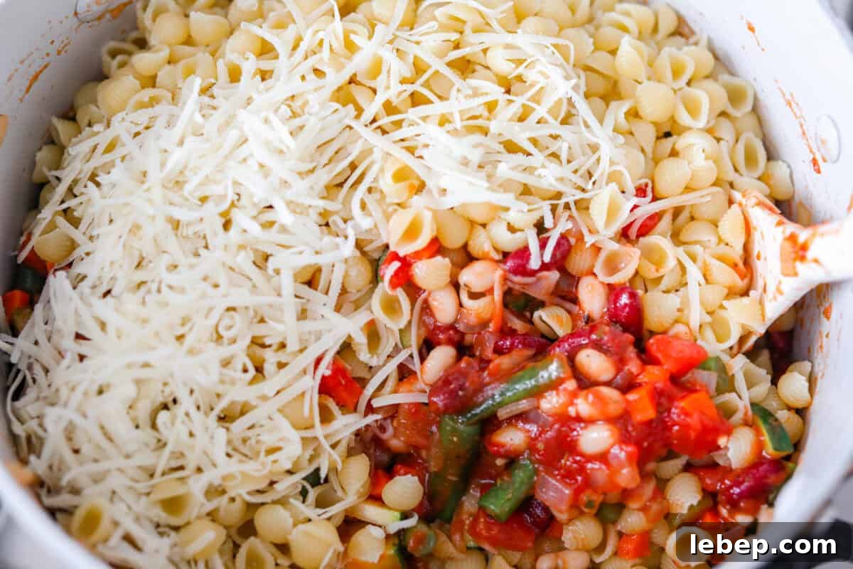 If you love my minestrone soup even a little, you have to try this minestrone casserole. It takes the cozy, veggie packed soup you already love and turns it into a hearty, cheesy pasta bake. It feels like weeknight dinner perfection. Cheese and noodles added to the veggie mixture.
