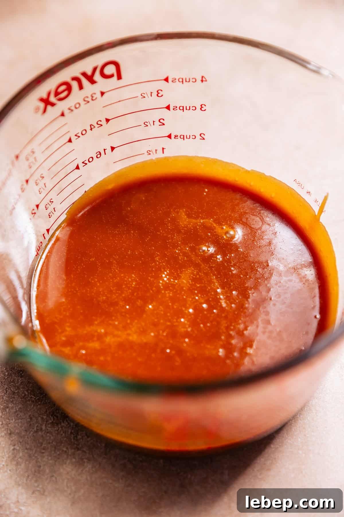 Salted Caramel Donuts with Shiny Caramel Glaze 9 A glass mixing bowl of salted caramel.