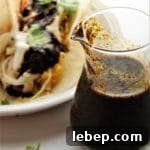Homemade Baja Fresh-Style Salsa Recipe — Fresh & Zesty Flavor 6 copycat baja fresh salsa in front of tacos