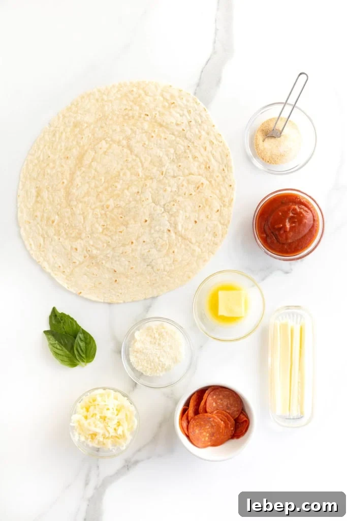 A large flour tortilla next to small glass dishes of pizza ingredients on a white marble counter.