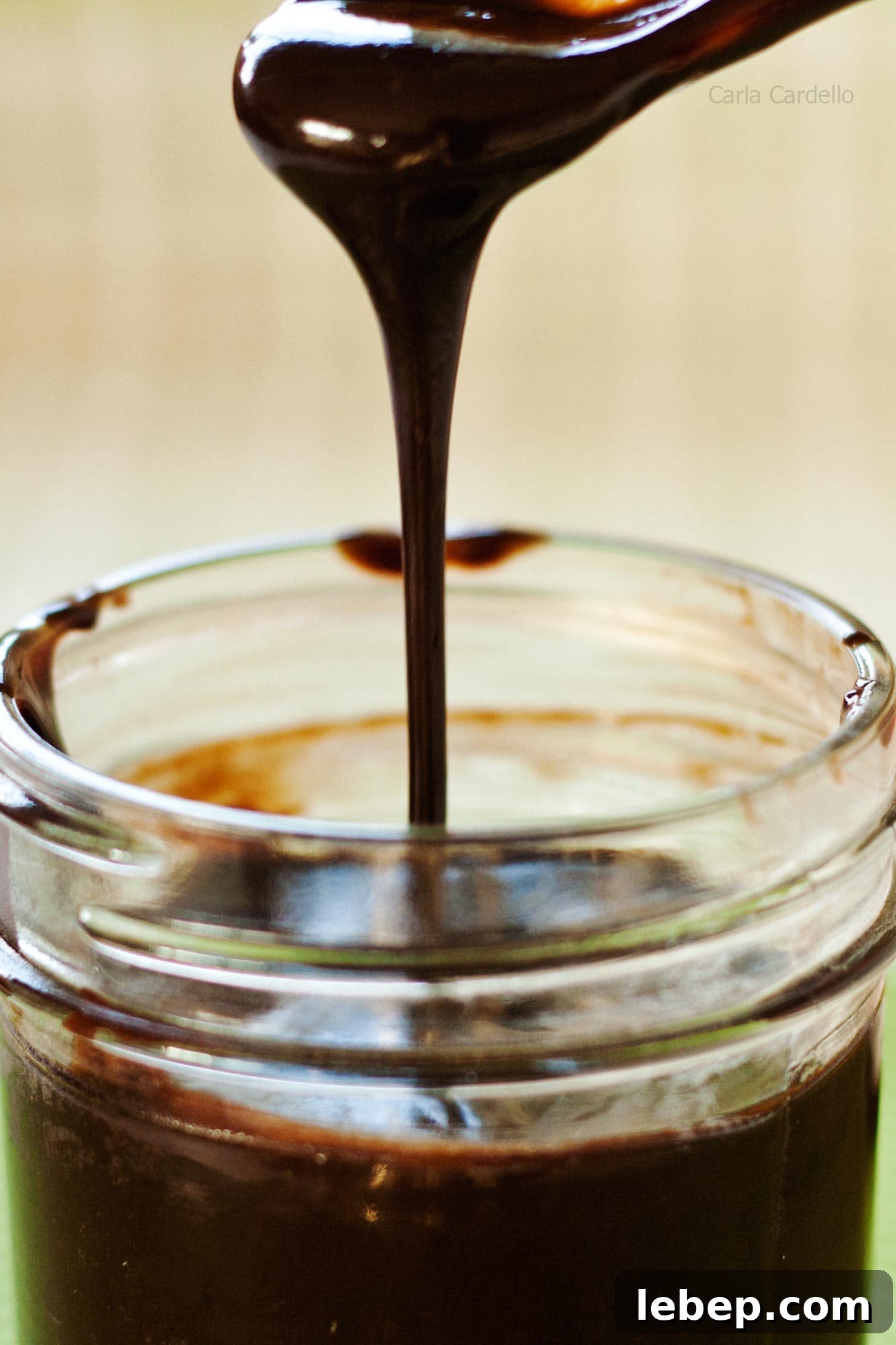 Nutella Sauce drizzling back into its jar