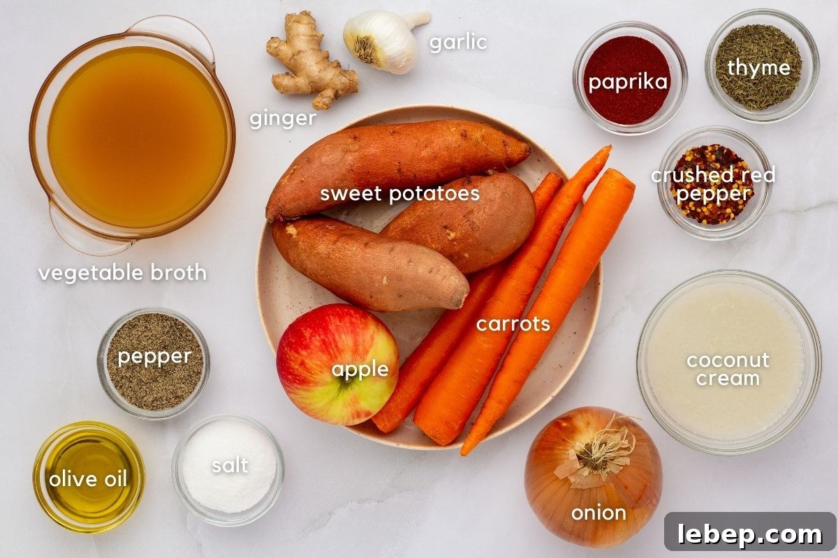 Carrot and Sweet Potato Soup with Ginger — Seasonal Comfort Bowl 3 Ingredients for Carrot, Sweet Potato & Ginger Soup: vegetable broth, ginger, garlic, paprika, thyme, crushed red pepper, oil, salt, pepper, onion, coconut cream, apple, carrot, and sweet potato.