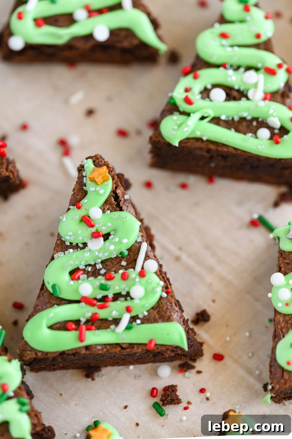 Christmas brownies on parchment paper.