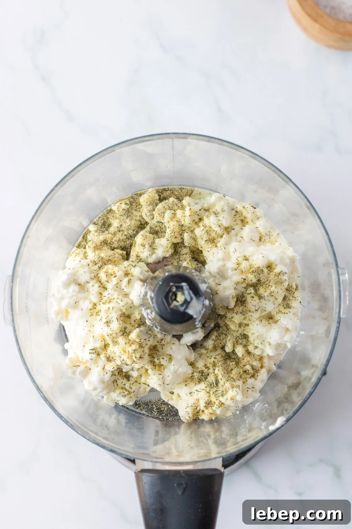 Creamy Cottage Cheese Ranch Dip Recipe for Parties and Snacks 5 An overhead image of cottage cheese ranch dip in a blender.