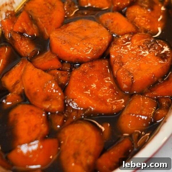 Southern candied yams with brown sugar, cinnamon, and butter, baked to golden perfection.