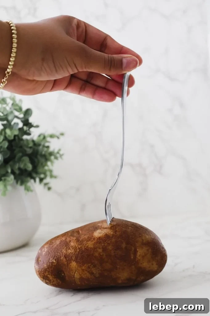 cooking a russet potato for the cheesy korean potato pancake
