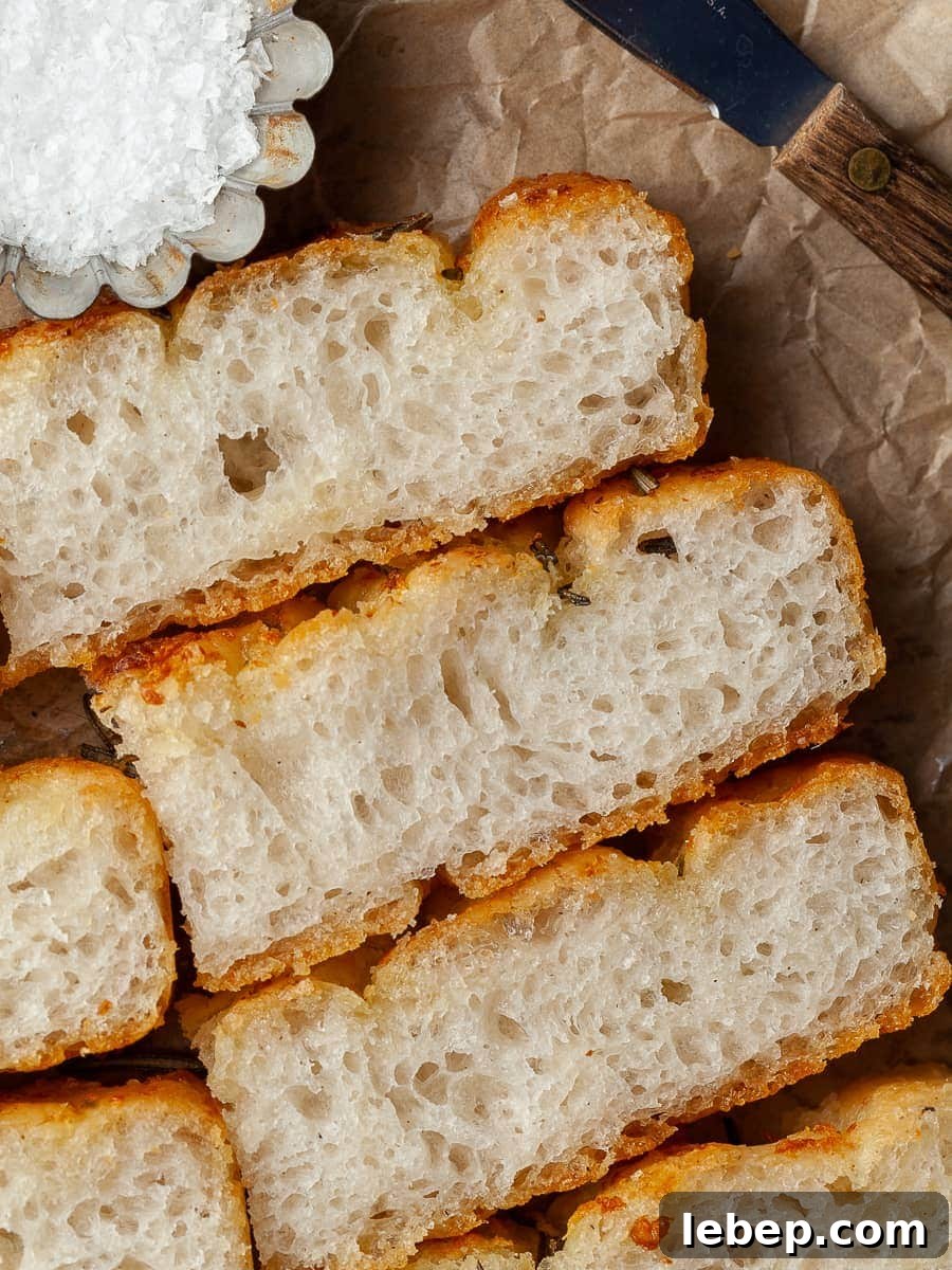 Gluten-Free No-Knead Focaccia Recipe: Crispy, Airy Loaf 11 sliced gluten free focaccia made with caputo fioreglute