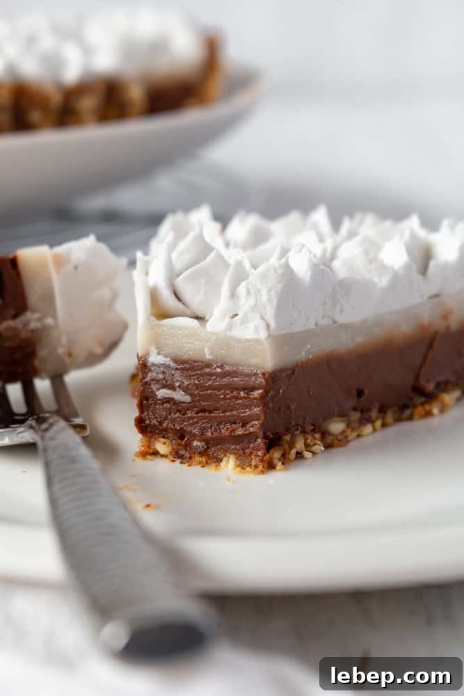 Chocolate Haupia Pie Recipe — Creamy Hawaiian Coconut Dessert 5 A close up of the two layers of chocolate haupie pie.