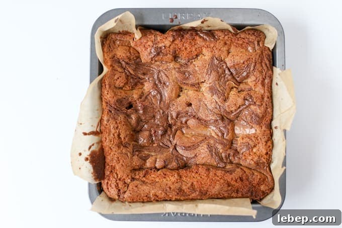 Completely indulgent, these chocolate caramel blondies with swirls of Nutella hit the spot like nothing else!