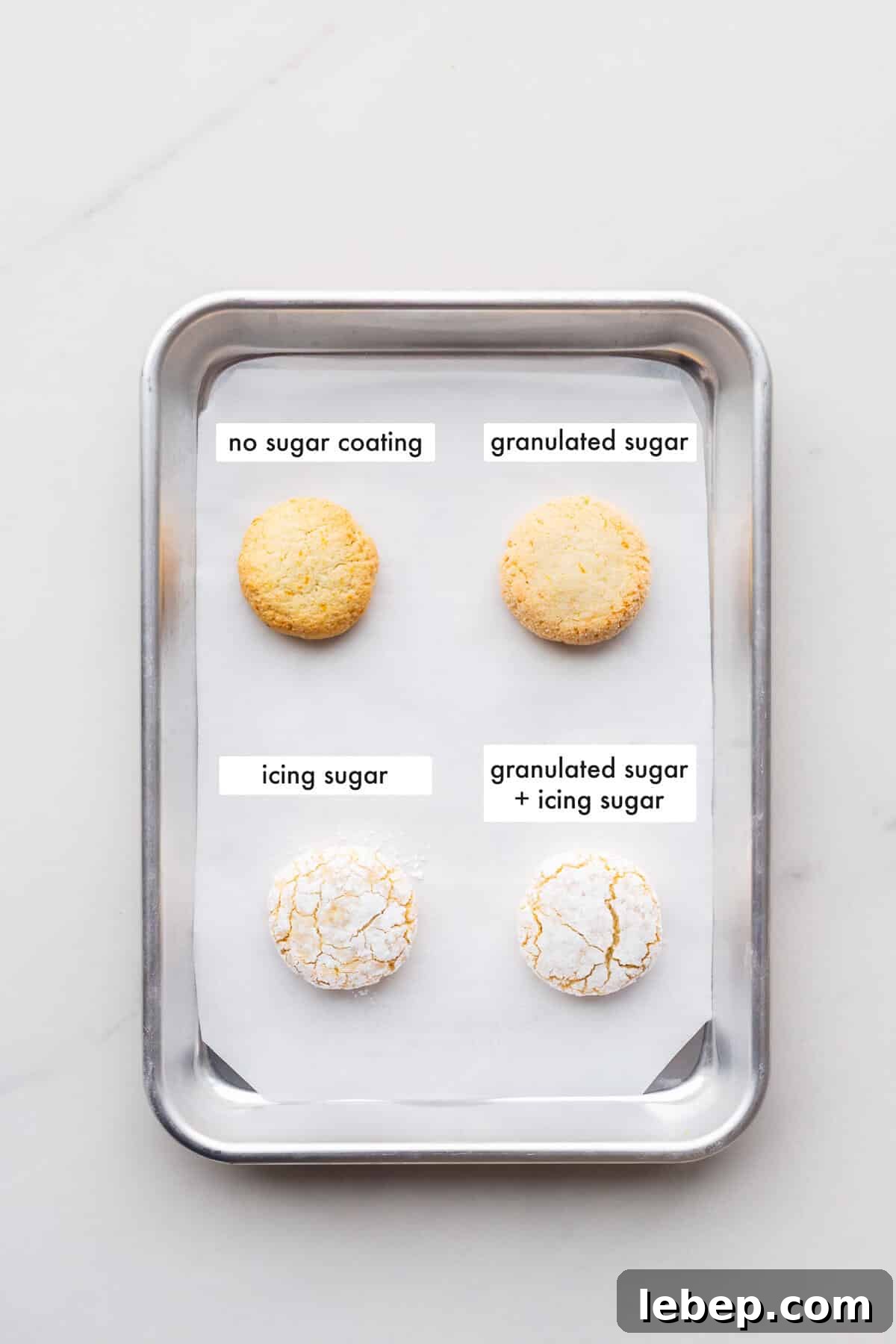 Orange Almond Amaretti Cookies Recipe — Zesty, Chewy Biscotti-Style Treats 10 Comparing rolling scoops of amaretti cookie dough in granulated sugar, icing sugar, granulated and icing sugar, or without any coating to show that coating in both granulated and icing sugar creates the prettiest amaretti cookies.