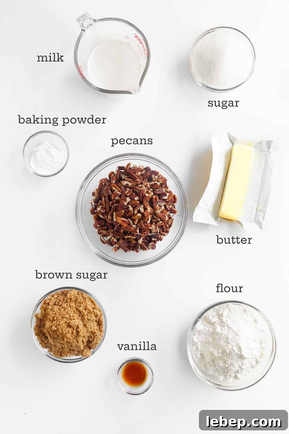 Pecan Pie Cobbler Recipe: Southern-Styled Gooey Pecan Dessert 4 Ingredients for pecan pie cobbler--pecans, milk, sugar, flour, butter, vanilla, and baking powder.