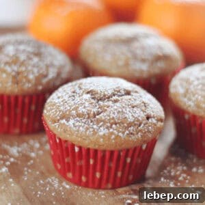 Gingerbread muffins in red muffin liners.