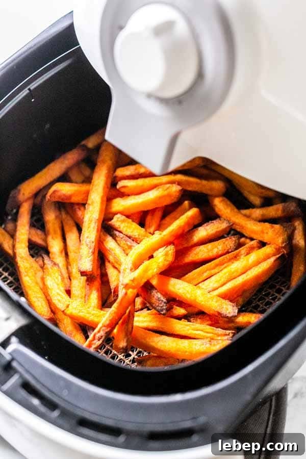 Crispy Air Fryer Sweet Potato Fries Recipe 2 Put sweet potato fries in the Air Fryer and cook them crispy. These Air Fryer frozen sweet potato fries are done in less than 15 minutes. Golden brown and crispy. They are a great side dish you can serve with any main dish.