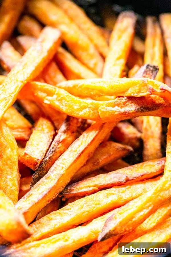 Crispy Air Fryer Sweet Potato Fries Recipe 5 Put sweet potato fries in the Air Fryer and cook them crispy. These Air Fryer frozen sweet potato fries are done in less than 15 minutes. Golden brown and crispy. They are a great side dish you can serve with any main dish.