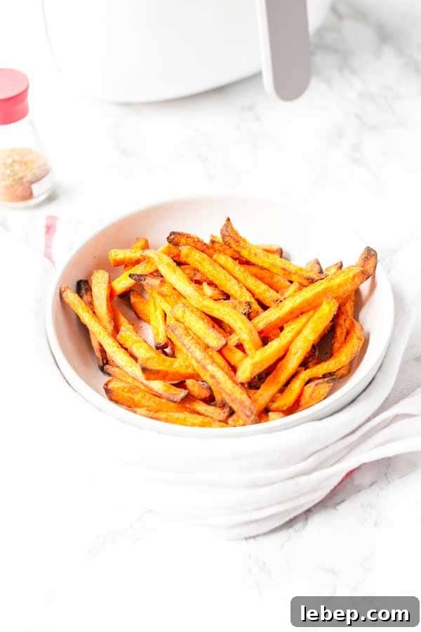 Crispy Air Fryer Sweet Potato Fries Recipe 9 Put sweet potato fries in the Air Fryer and cook them crispy. These Air Fryer frozen sweet potato fries are done in less than 15 minutes. Golden brown and crispy. They are a great side dish you can serve with any main dish.