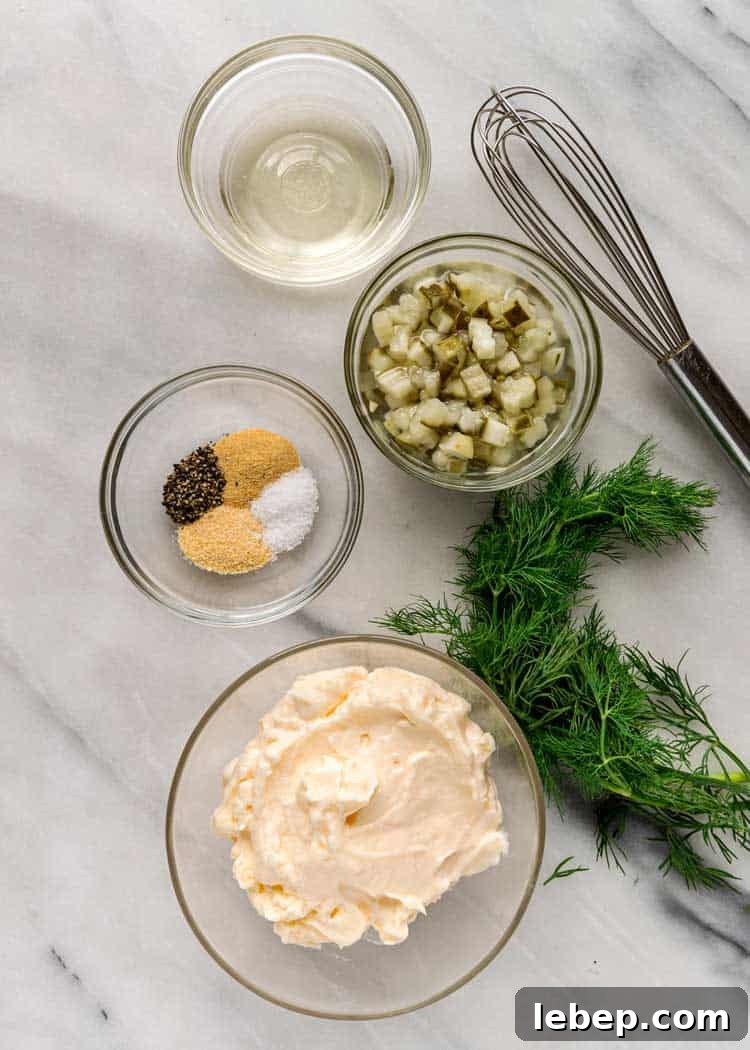 Classic Creamy Tartar Sauce Recipe for Fish and Seafood 4 overhead: ingredients needed to make the tartar sauce recipe