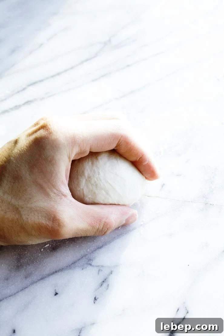 Authentic New York Bagel Recipe: Crispy Outside, Chewy Inside 10 How to roll dough into rounds
