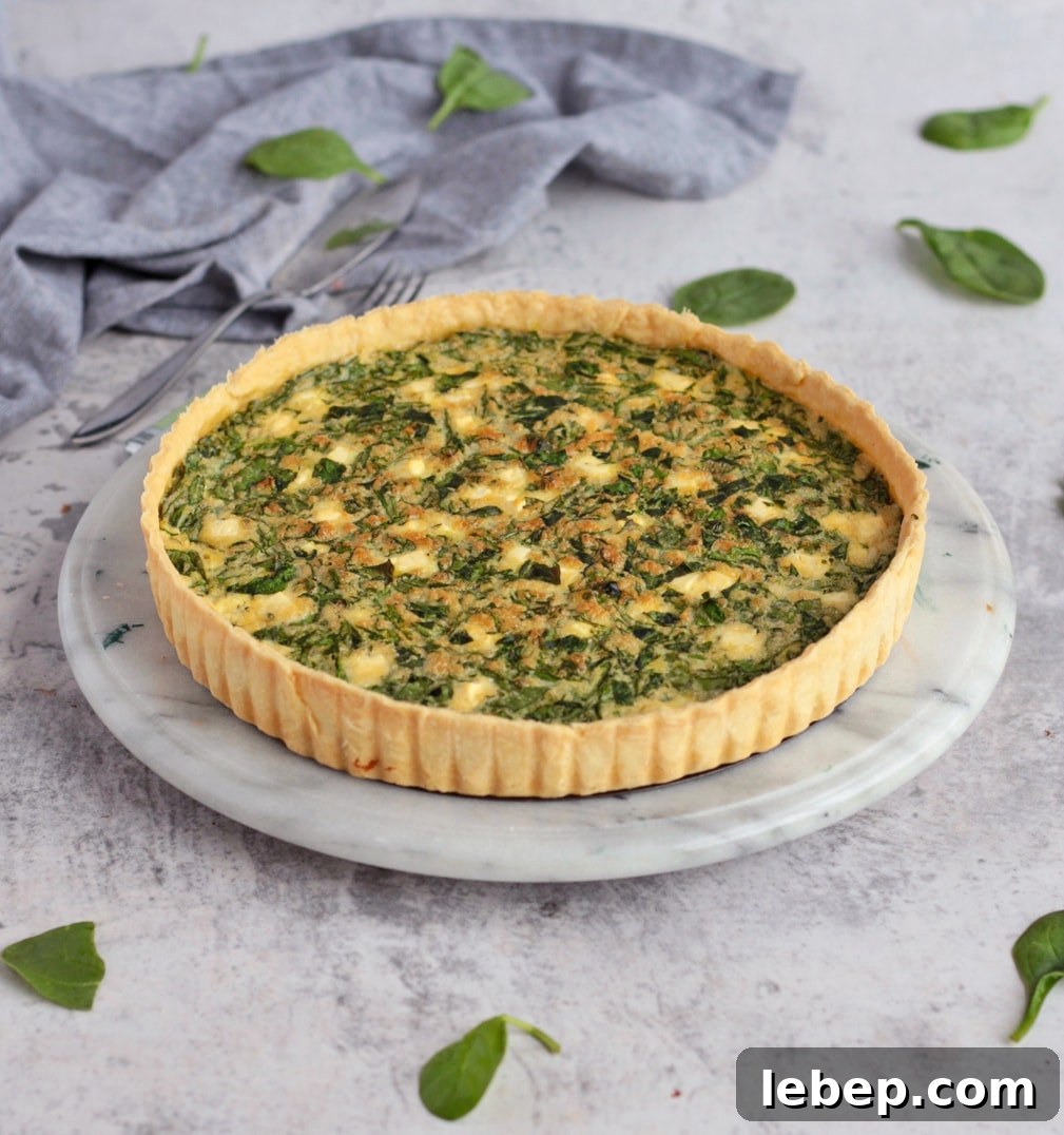 Feta Quiche on a Marbled Board.