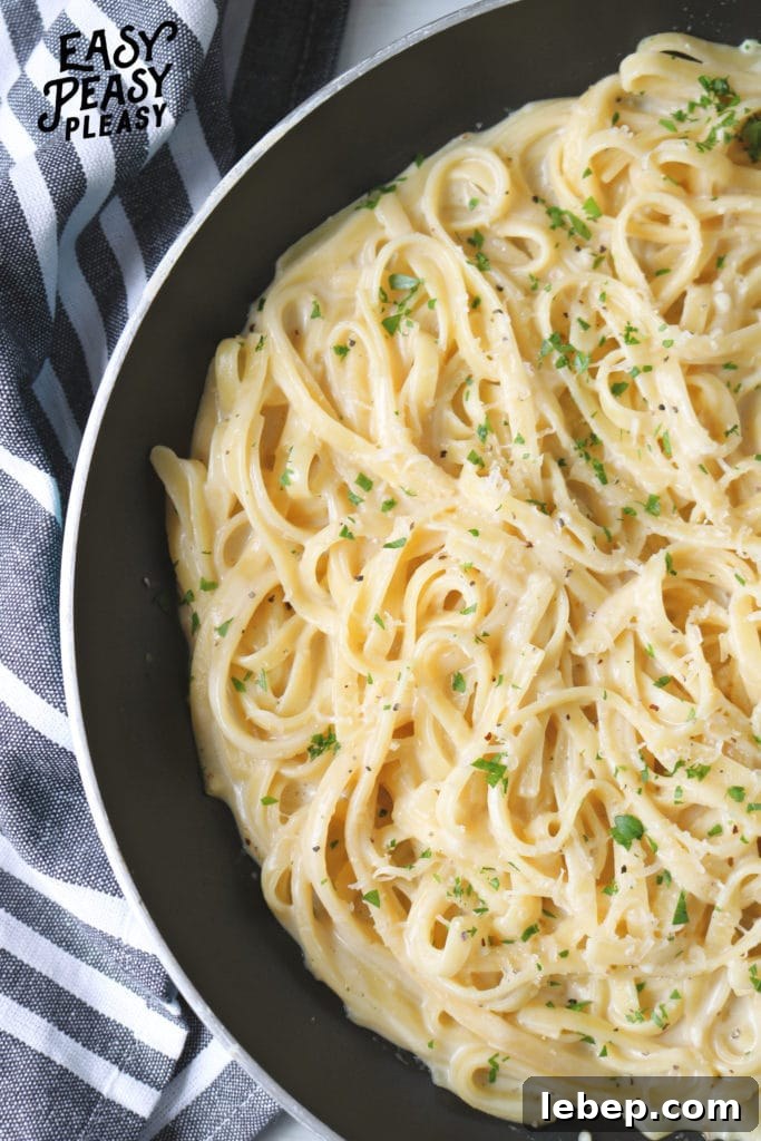 25-Minute One-Pan Fettuccine: Creamy Dinner in One Skillet 4 Easy One Pan Fettuccine is perfect for any weeknight meal.
