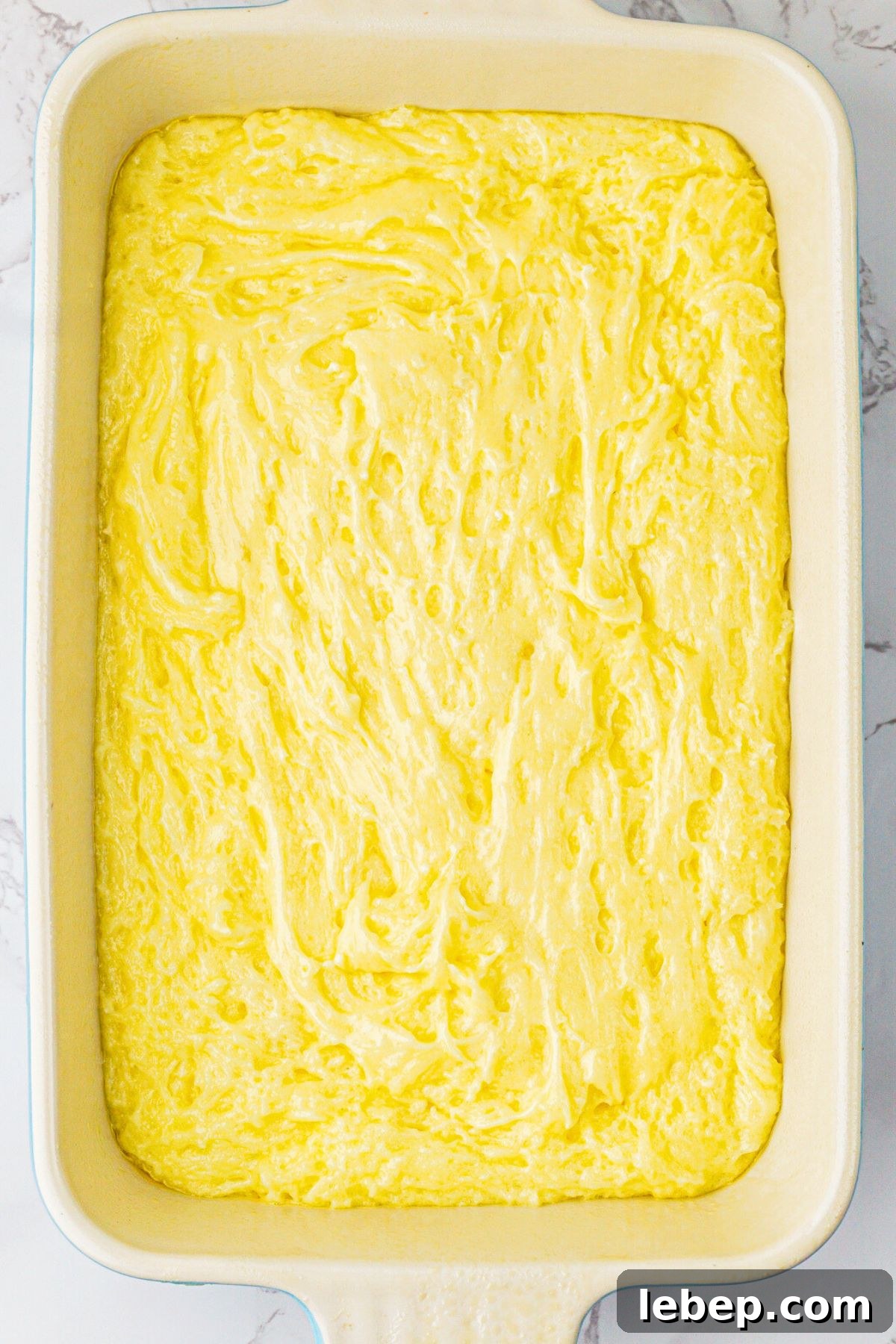 9x13 baking dish with batter mixed and spread into dish.