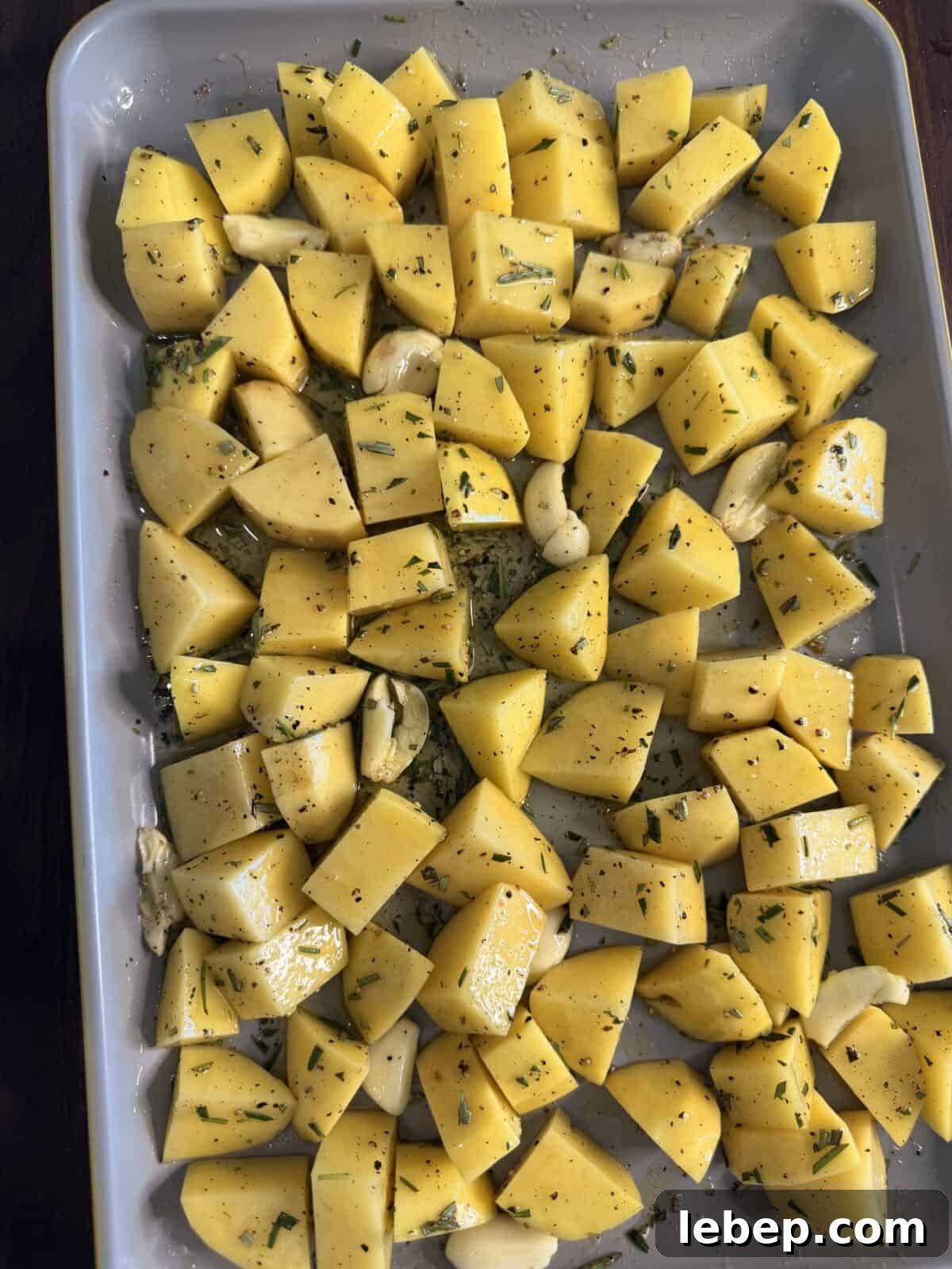 Crispy Rosemary Garlic Roasted Potatoes Recipe 3 Seasoned potatoes ready for roasting