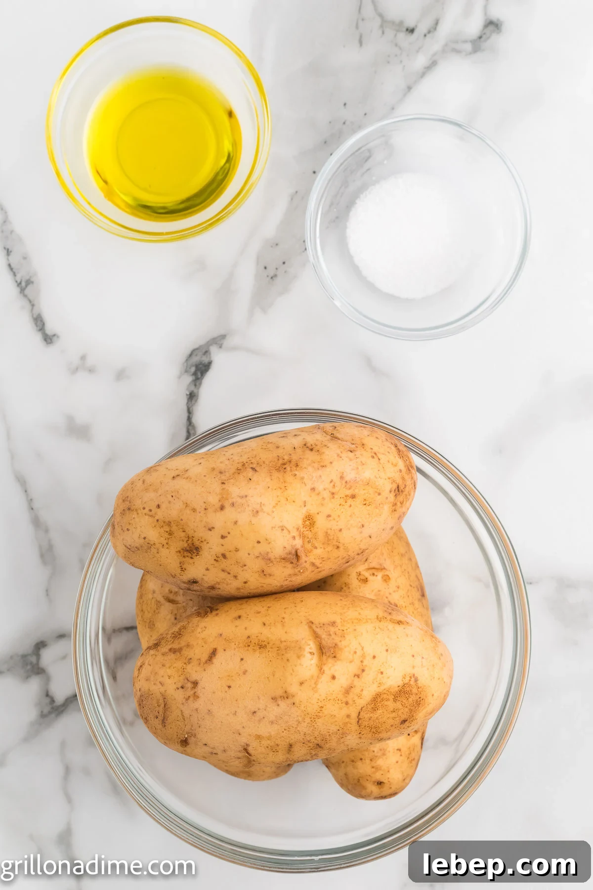 Smoked Baked Potatoes Recipe: Crispy Skin, Smoky Flavor 3 Oil, salt and baked potato in a bowl