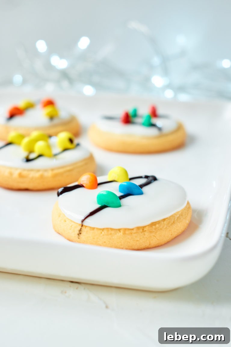 Christmas Light Sugar Cookies: Festive Decorating Tips & Recipe 2 four of the completed Christmas Lights Cookies served on a white tray