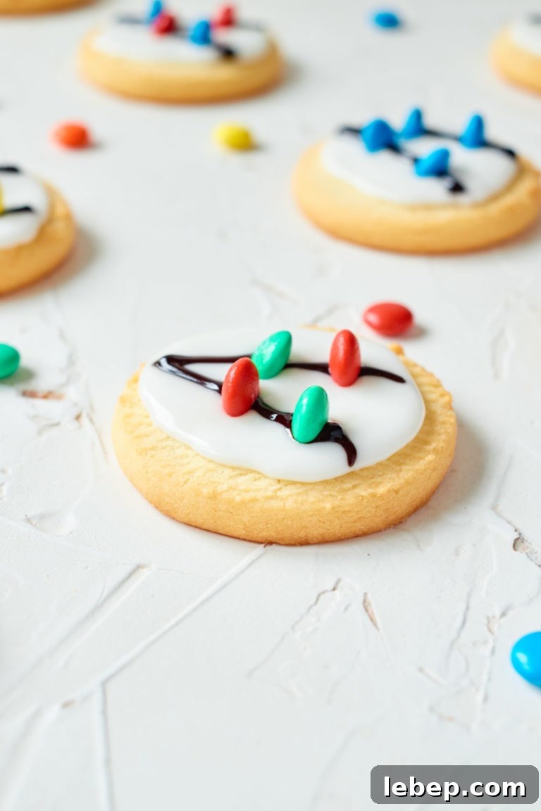 Christmas Light Sugar Cookies: Festive Decorating Tips & Recipe 4 some of the decorated cookies on a countertop