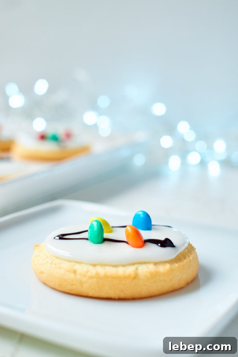 Christmas Light Sugar Cookies: Festive Decorating Tips & Recipe 6 one of the Christmas Light Cookies served on a white plate